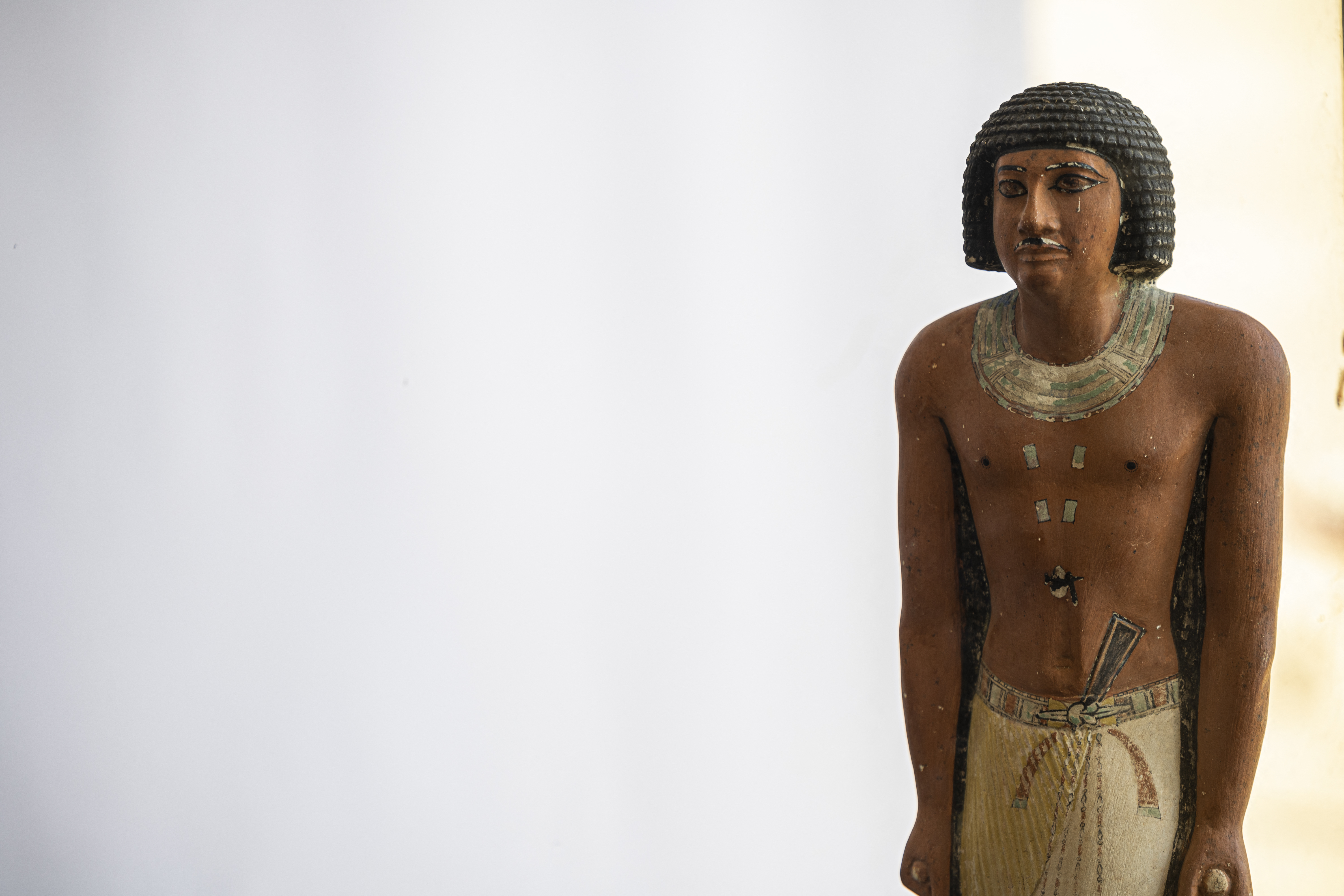 A pharaoh statue is on display during a press conference at the Saqqara archaeological site, south of Cairo on January 26, 2023. /AFP