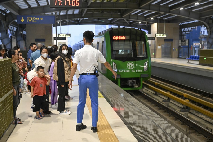 People wait for a train of the China-built Cat Linh-Ha Dong urban elevated railway in Hanoi, Vietnam, December 9, 2023. /Xinhua
