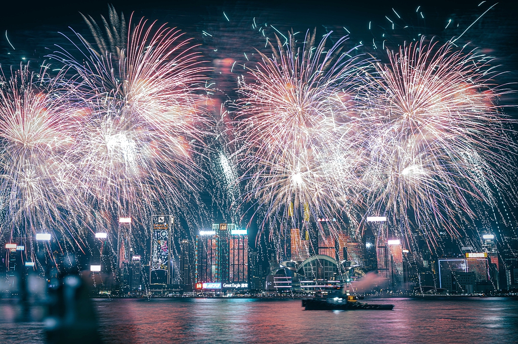 Chinese New Year fireworks light up the sky over Victoria Harbor in Hong Kong, February 11, 2024. /CFP