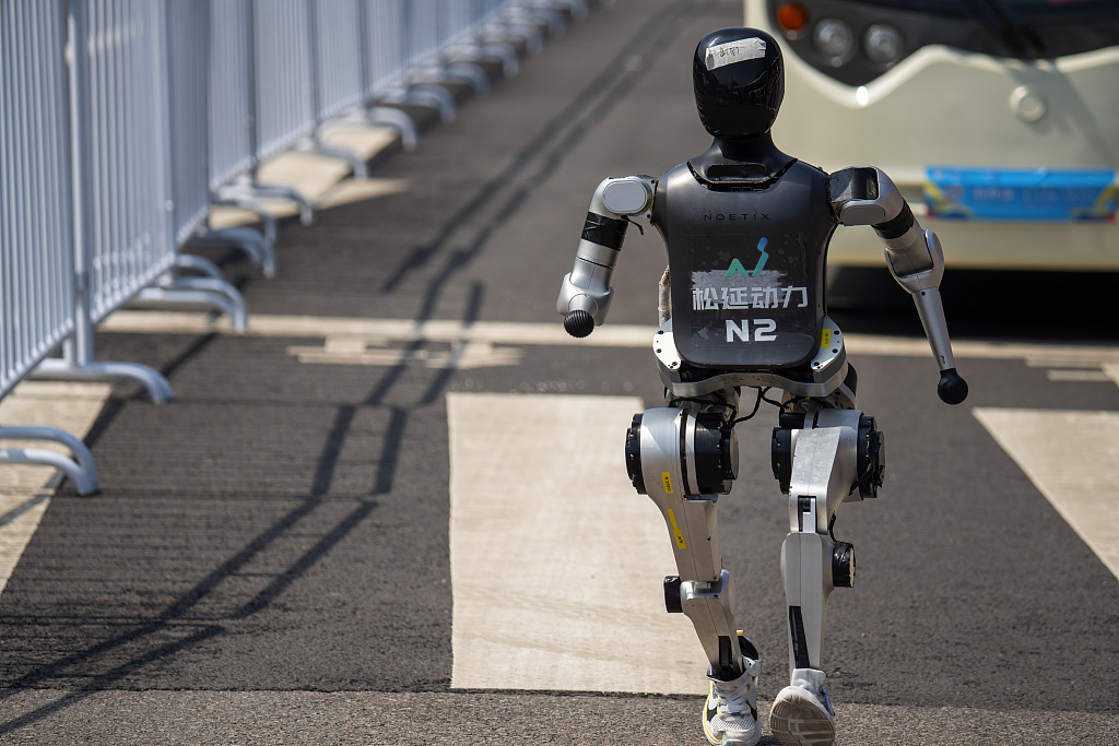 A humanoid robot takes part in the half marathon for humanoid robots held in Beijing on April 19, 2025. /VCG